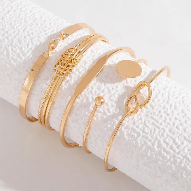 Set de Pulseras Doradas Victoria Herrera